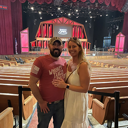 Tara Butler ’02 and her husband Billy at the Grand Ole Opry in Nashville, Tennessee. 