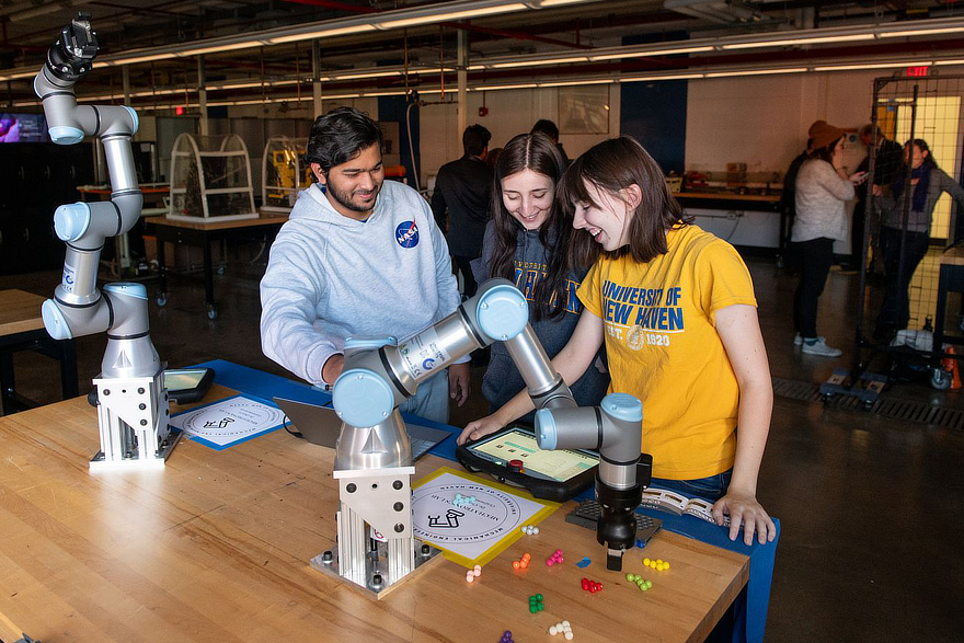 Students in makerspace working on robotics project