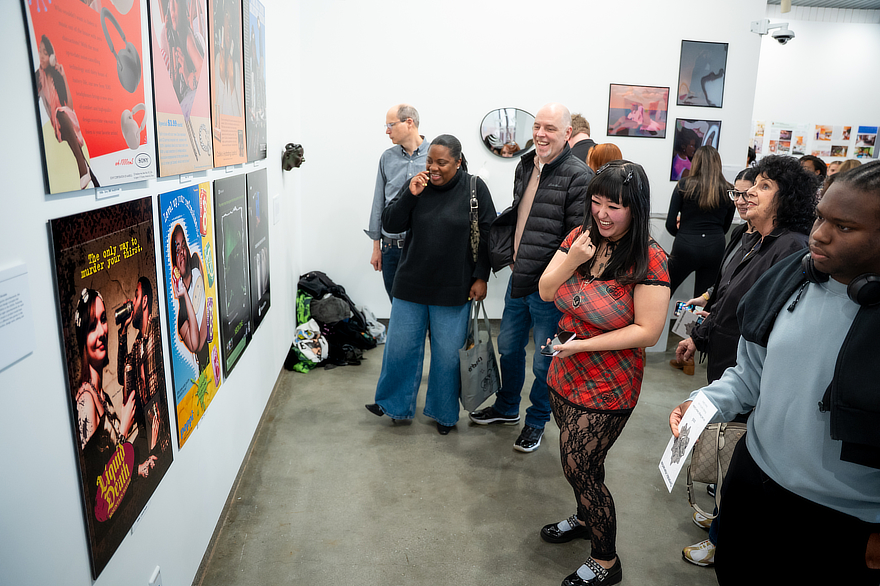 Crowd in gallery at Senior art show opening