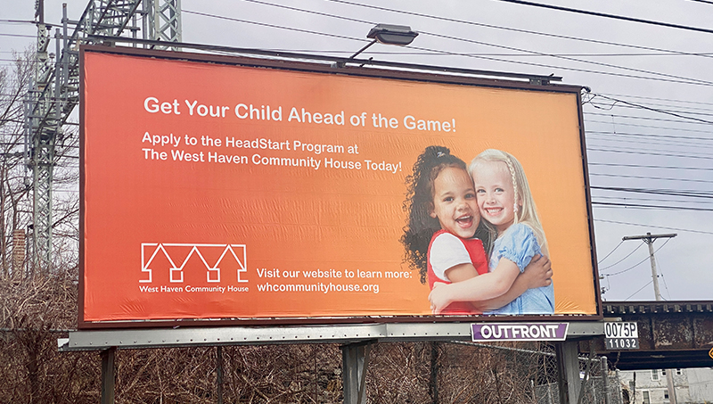 The West Haven Community House billboard on Campbell Avenue in West Haven.