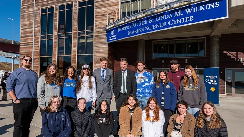 President Jens Frederiksen and Mayor Justin Elicker with students