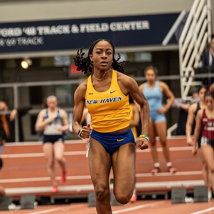 Hollisa Liburd ’27 running on track