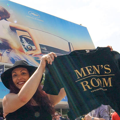 Woman holding movie t-shirt