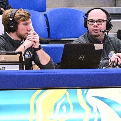 Men wearing mic head sets