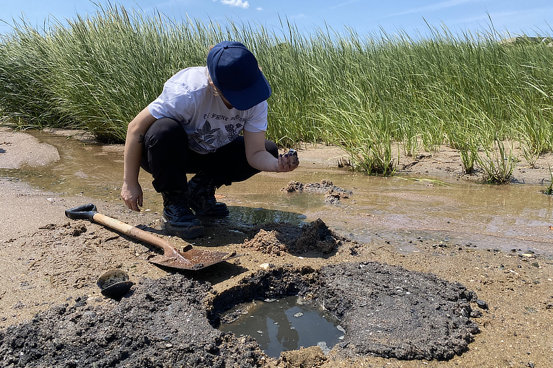 Student working in water