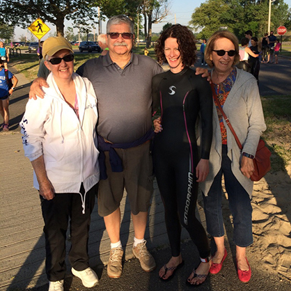 Crystal Holick ’23 MBA (second from right) at her first triathlon.