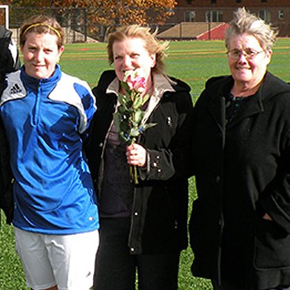 Selina Moylan O’Toole ’10, ’14 M.S., with family on senior day in 2008.
