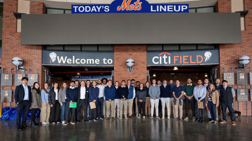 University students outside baseball stadium