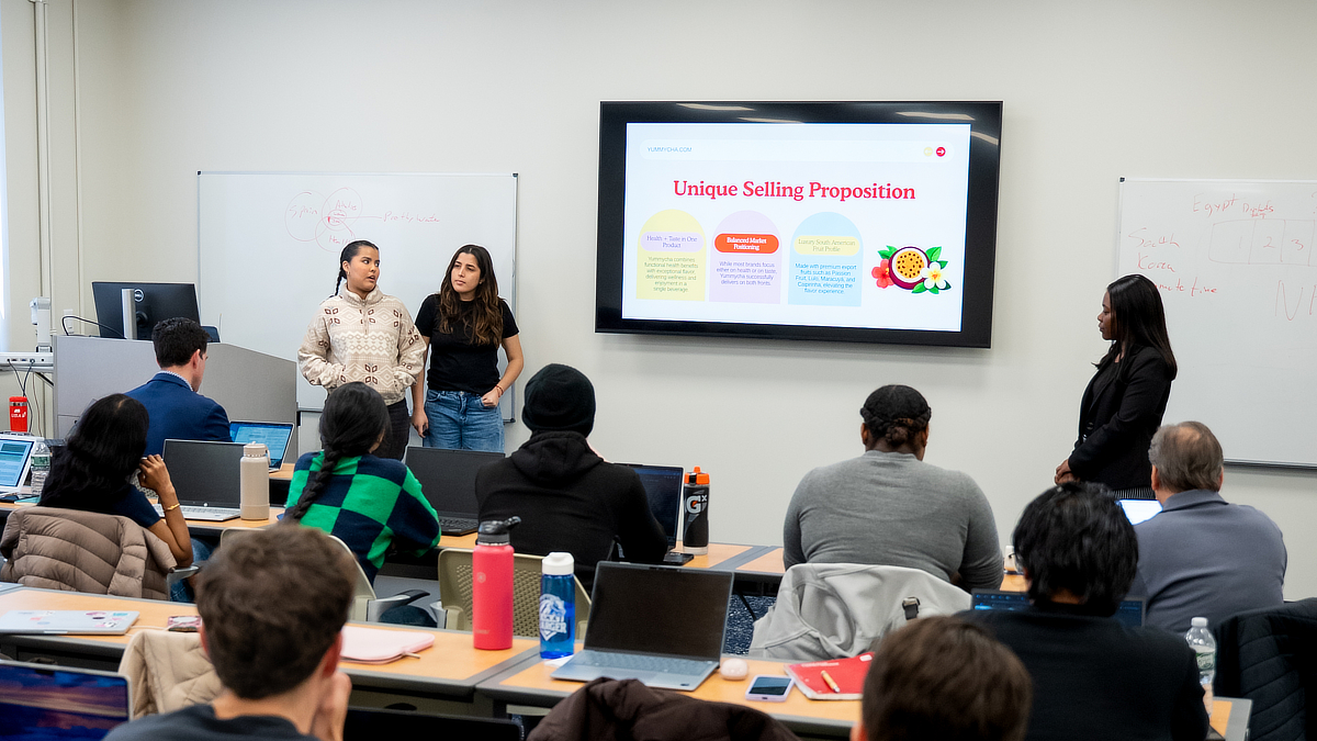 Students giving presentation in classroom