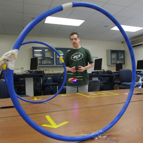 Karen Yang, 17 and Andrew Cappola, 17, test a wind-powered vehicle