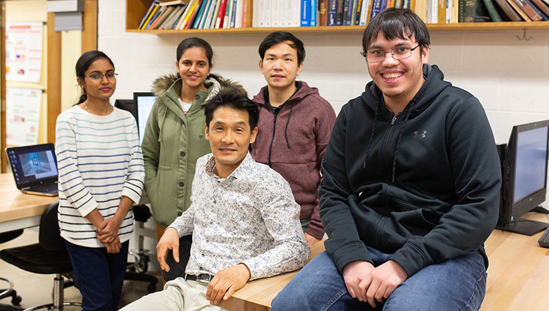 Image of Dr. Chang and students