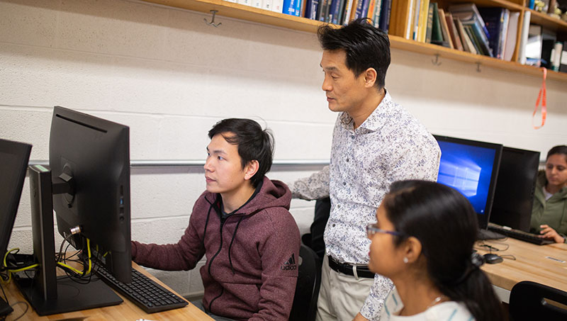 Image of Dr. Chang and students