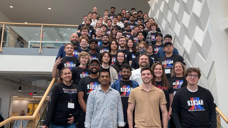 Participants and volunteers at the CPTC 2024 competition held at the University of New Haven