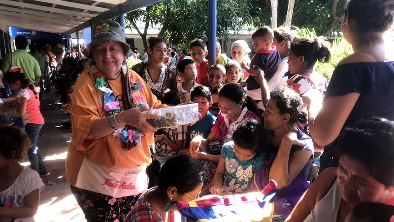 Dr. Audrey Blondin giving candy to patients waiting in line for eye exams in Nicaragua in early 2020.