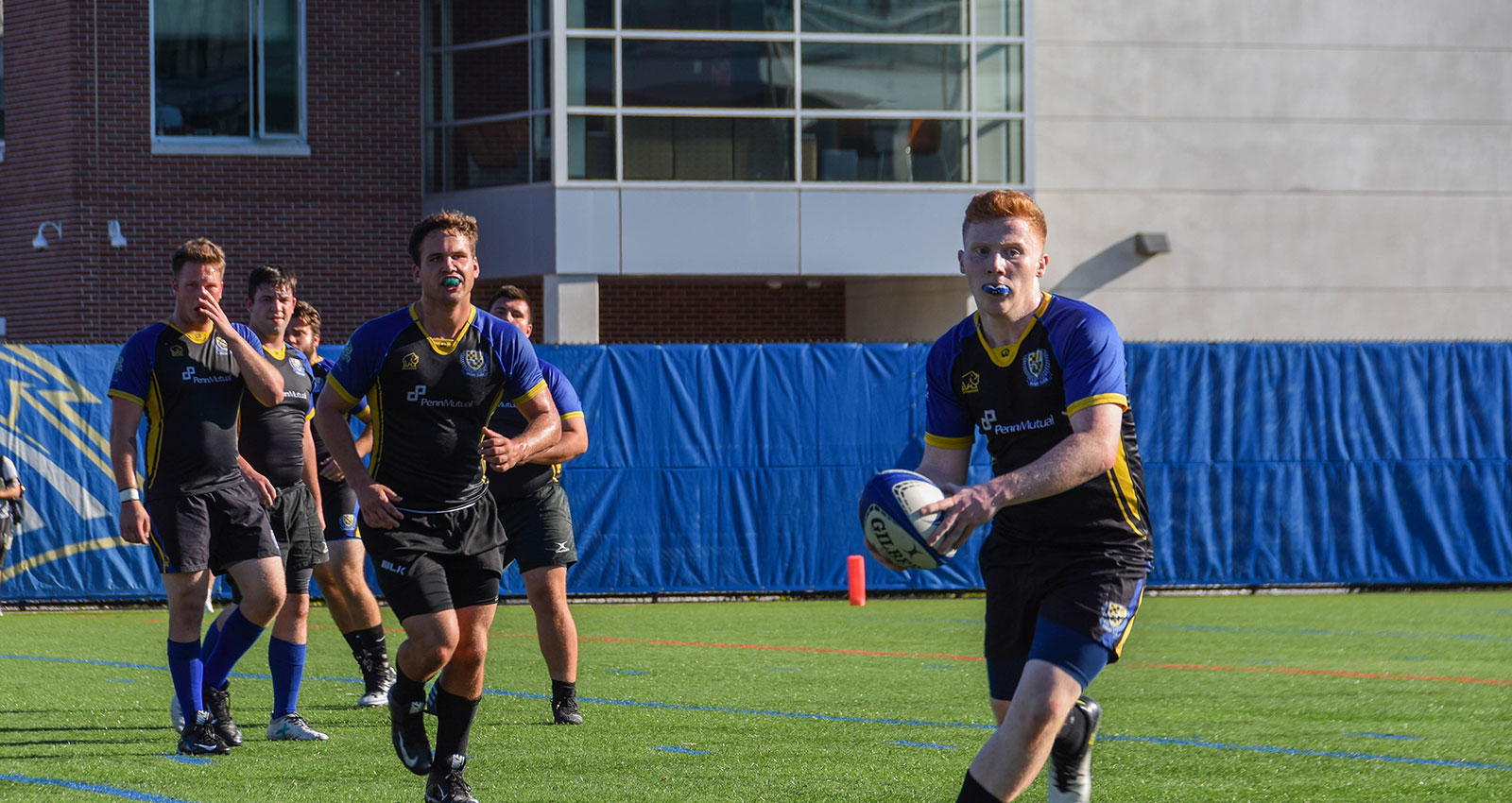 Student playing rugby