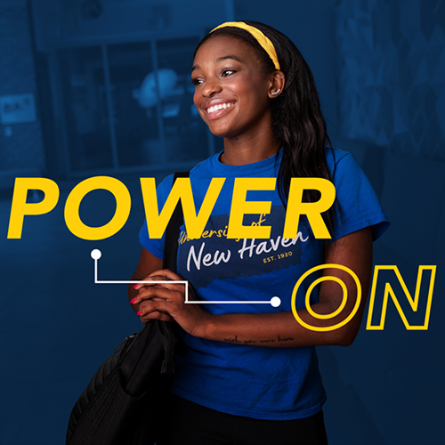 Power On graphic over a smiling student on a dark blue background.