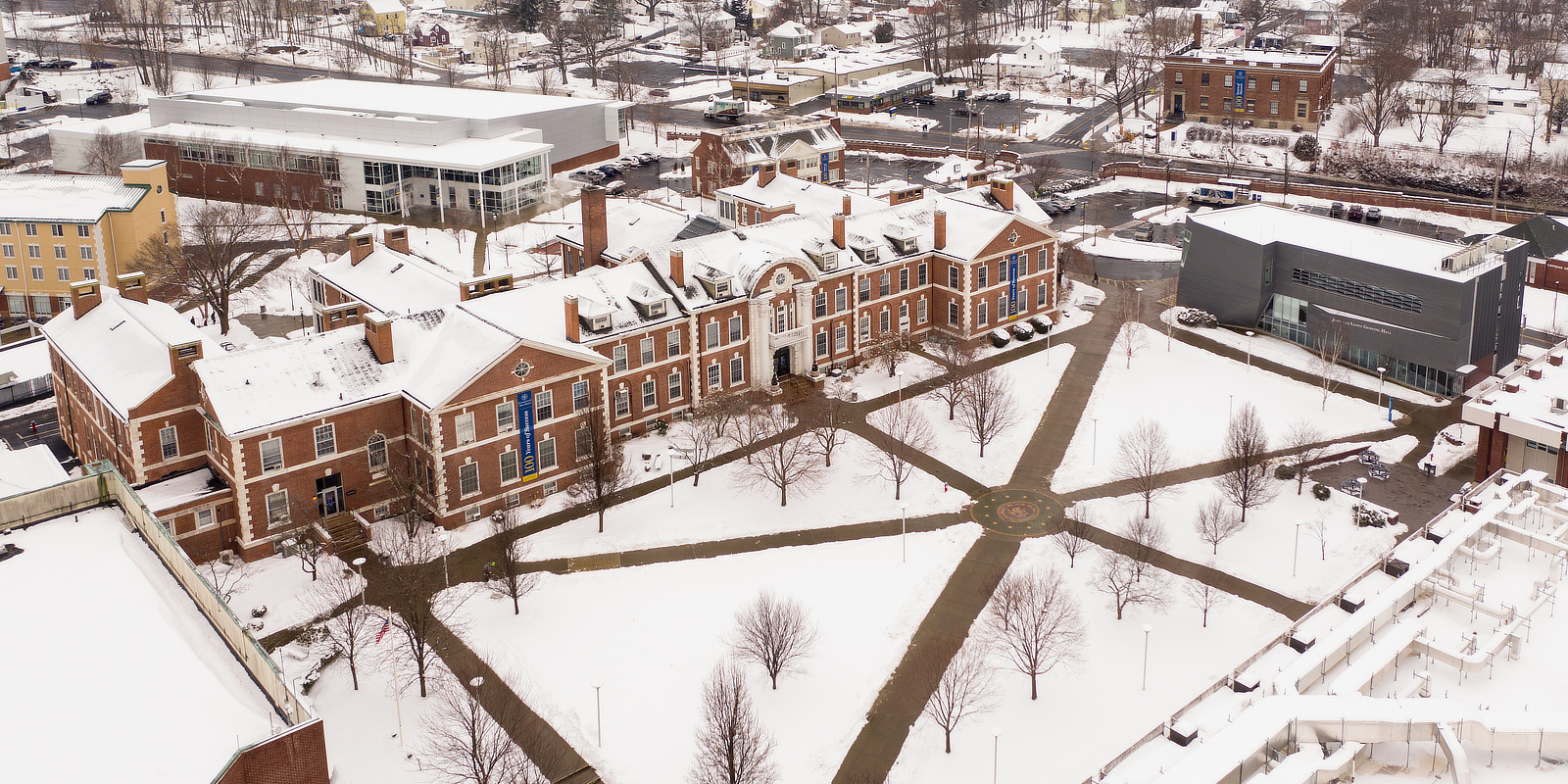 Aerial view of campus with snow