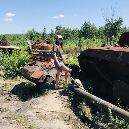 Olena Lennon, Ph.D., at a Russian tank graveyard