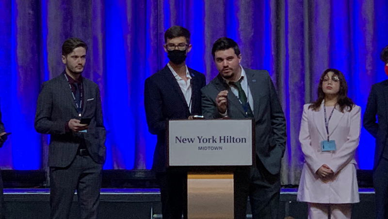 Aleksandros Spaho ’24 (left, at podium) at the NMUN conference in New York.