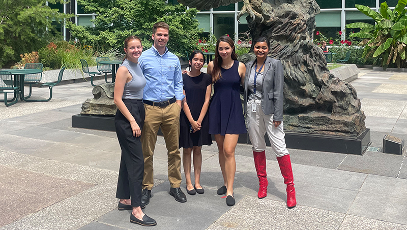 Vidushi Jha ’23 (center) is completing an internship with the U.S. Department of State.