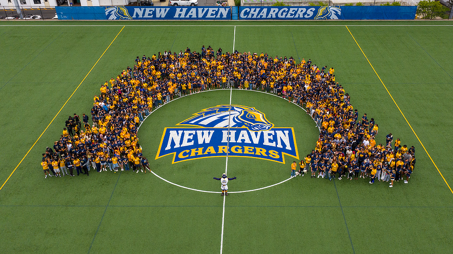 The Class of 2030 gathered on Kathy Zolad Stadium to take the traditional class photo.