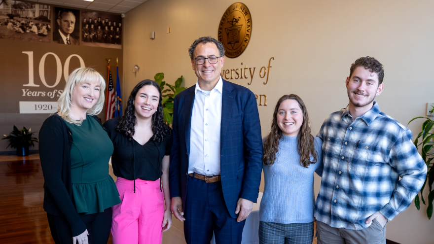 (left to right) Katelyn Beach '25, '26 MBA; Zoe Santos '28; David Sussman; Tess Blair '28; Connor Mooney '29