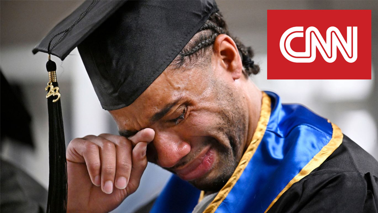 Student at commencement crying.