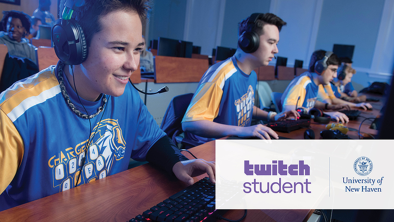 Photo of University of New Haven students with esports headsets.
