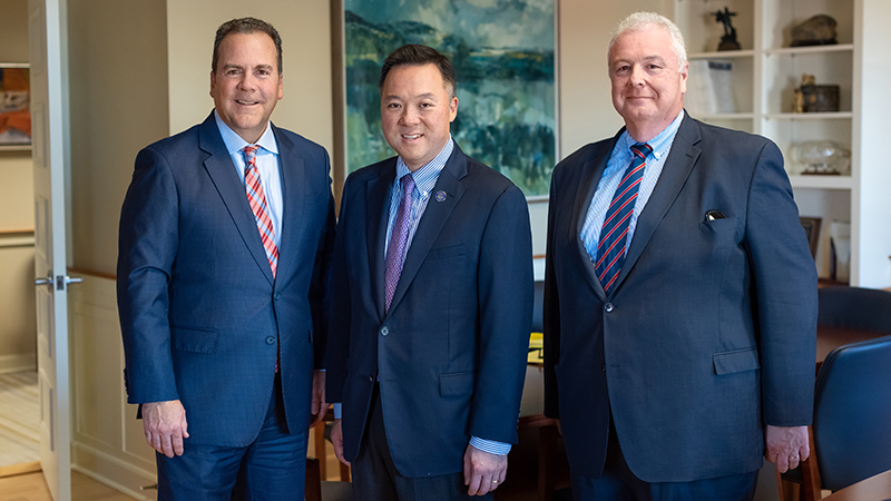 Left to right: Interim President Sheahon Zenger, Ph.D.; Attorney General William Tong; Mario Gaboury, J.D., Ph.D., dean of the Lee College.