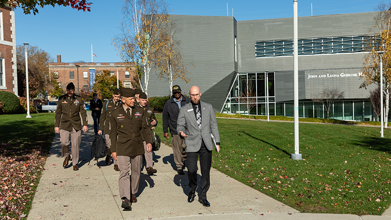 Ryan Noonan ’20, ’23 M.S. (right) walking with Sergeant Major of the Army Michael A. Grinston, who was visiting for the University’s Veterans Day Observance.