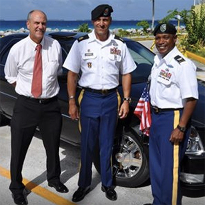 David Negron ’24 (center) on official military business while stationed in the Marshall Islands. 