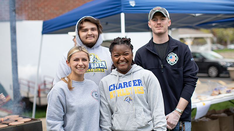 Members of the University’s Fire Science Club served lunch to their fellow Chargers.