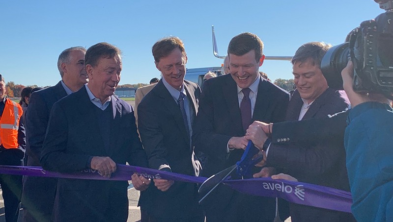 Image of the ribbon cutting from the celebration.