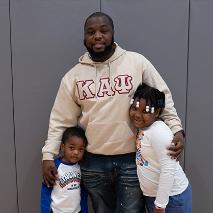 Jim Prosper with his two kids.