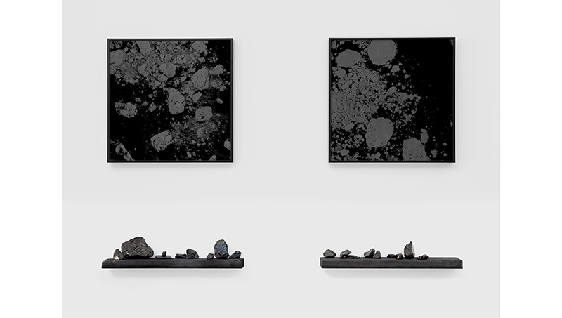 Multiplier, 2019, Laser etched acrylic, aluminum, burnt wood, and sea coal, 24 x 36 inches. The images are satellite views of the Arctic Sea ice breaking up.
