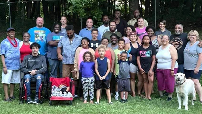 Linda Copney-Okeke and her “natural family”, arm-in-arm, at a family reunion in Pennsylvania earlier this year.
