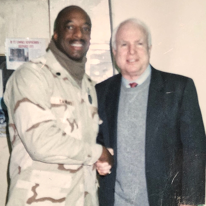 Dr. Robert Sanders and John McCain.