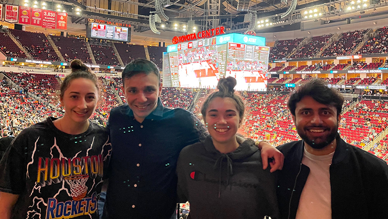 Group image of, left to right: Left to right: Keira Integlia, Andreas Xenofontos, Josie Schmidt, and Mohammed Anas Ali at a Houston Rockets game.