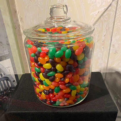 A jar filled with jelly beans.