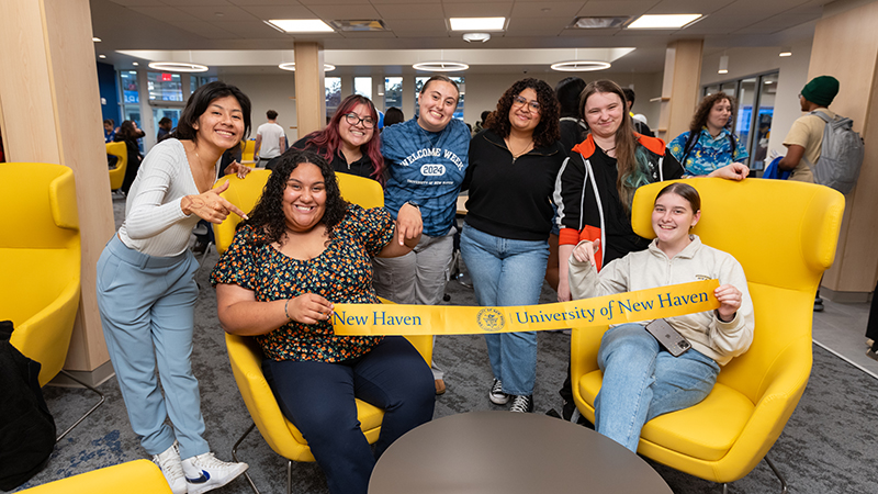 Darby Brown '25 (second from left) and fellow students in new Commuter Lounge