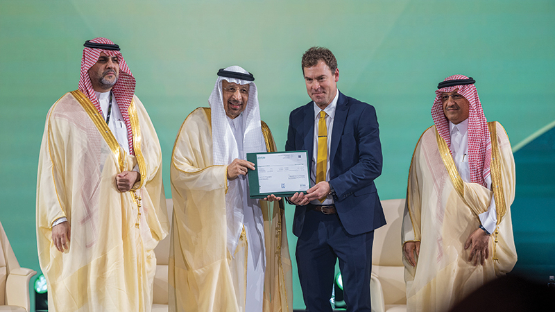 President Frederiksen receives a document during a ceremony in Riyadh, Saudi Arabia while announcing the new campus.