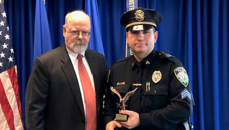 An image of (L-R) Connecticut’s U.S. Attorney John Durham with University of New Haven Police Sergeant Luis Dos Santos