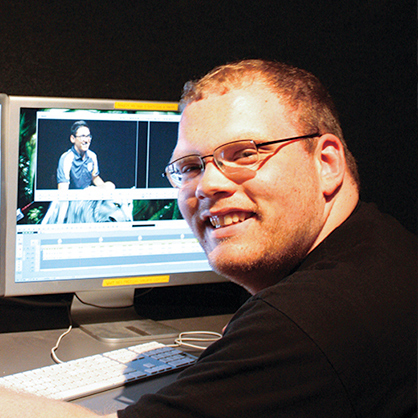 An image of communications alumnus, Joseph Brown. He experienced professional training in communication and media studies with state-of-the-art facilities and real-world experience.