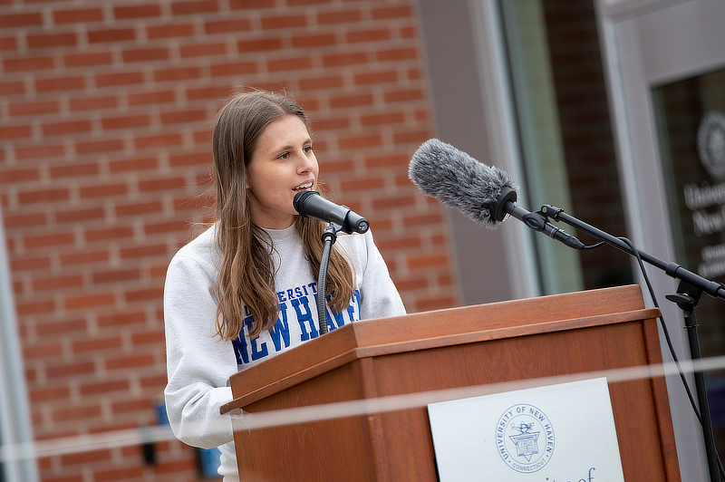 Student speaking at event